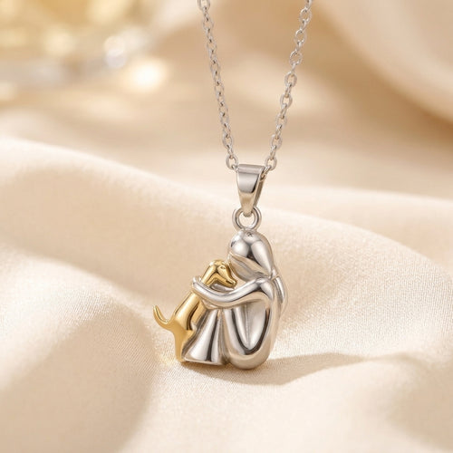 Hjärtekram halsband i silver och guld